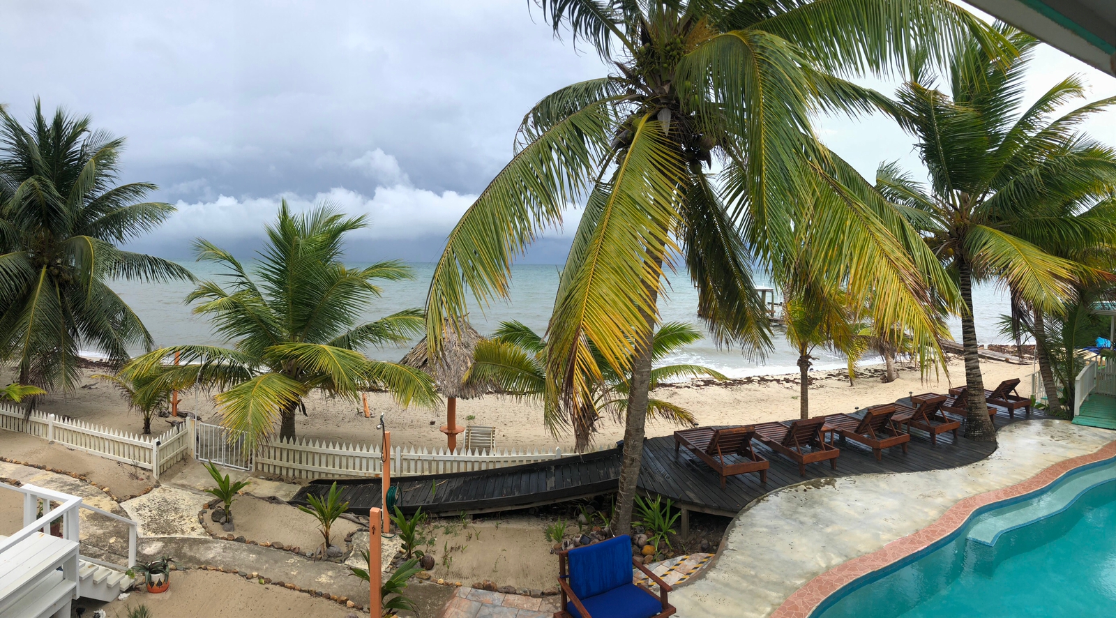 Elevated view over the Coral Cove Inn pool and Maya Beach